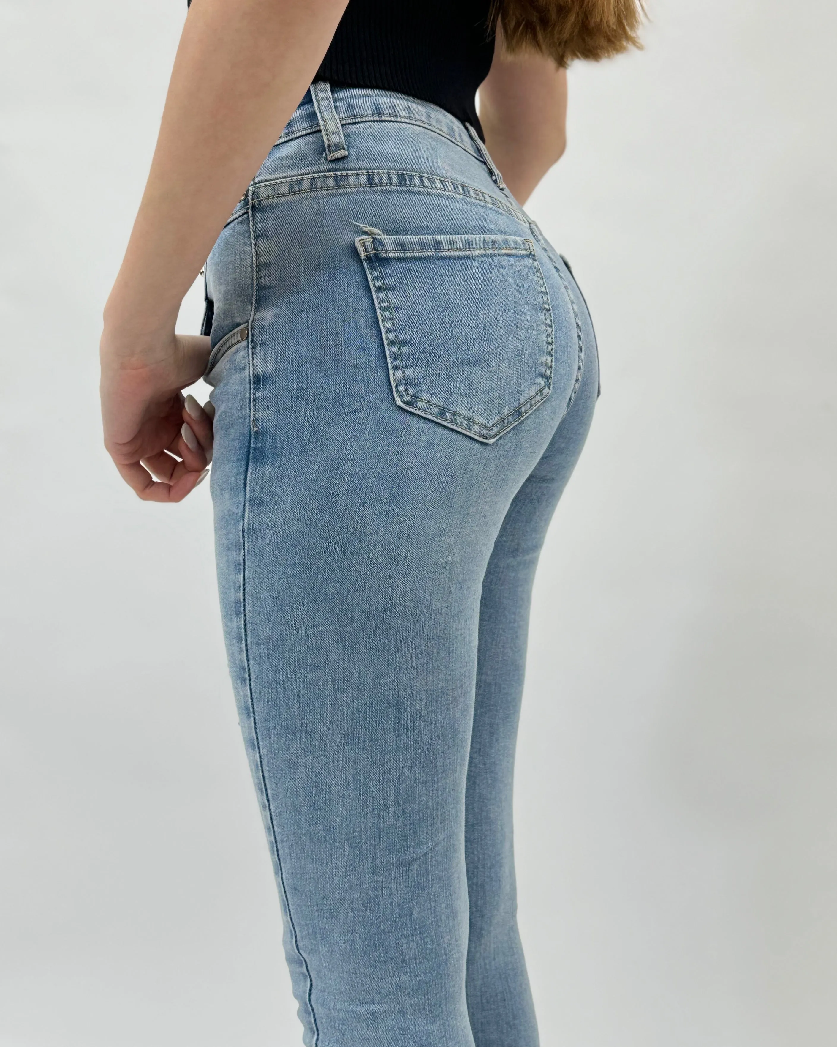 Jeans skinny vita alta con brillantini